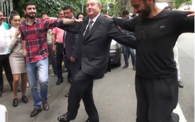 President Sarkissian is dancing with environmental activists, who are protesting against the Amulsar mine